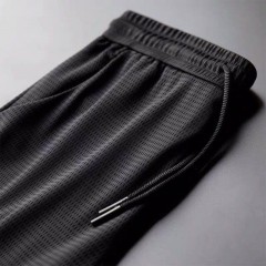 新款空調(diào)褲男士冰絲休閑褲夏季薄款網(wǎng)眼褲男運(yùn)動(dòng)大碼寬松長褲男